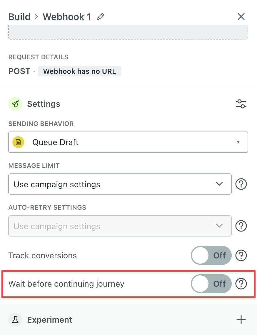 At the bottom of settings in the webhook action panel is the toggle for pausing journeys.